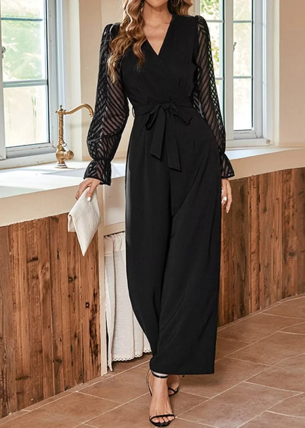 Detail of the stitching and see-through fabric on the jumpsuit