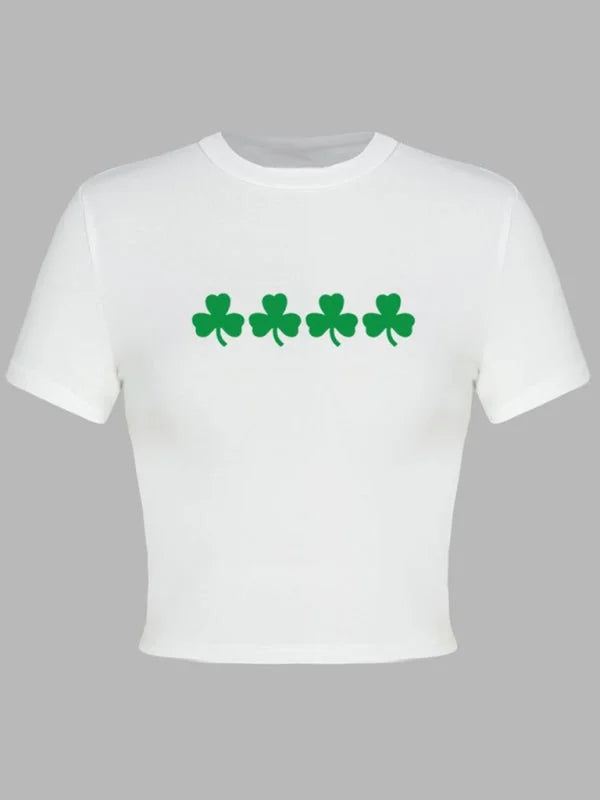 Close-up of green leaf print on t-shirt