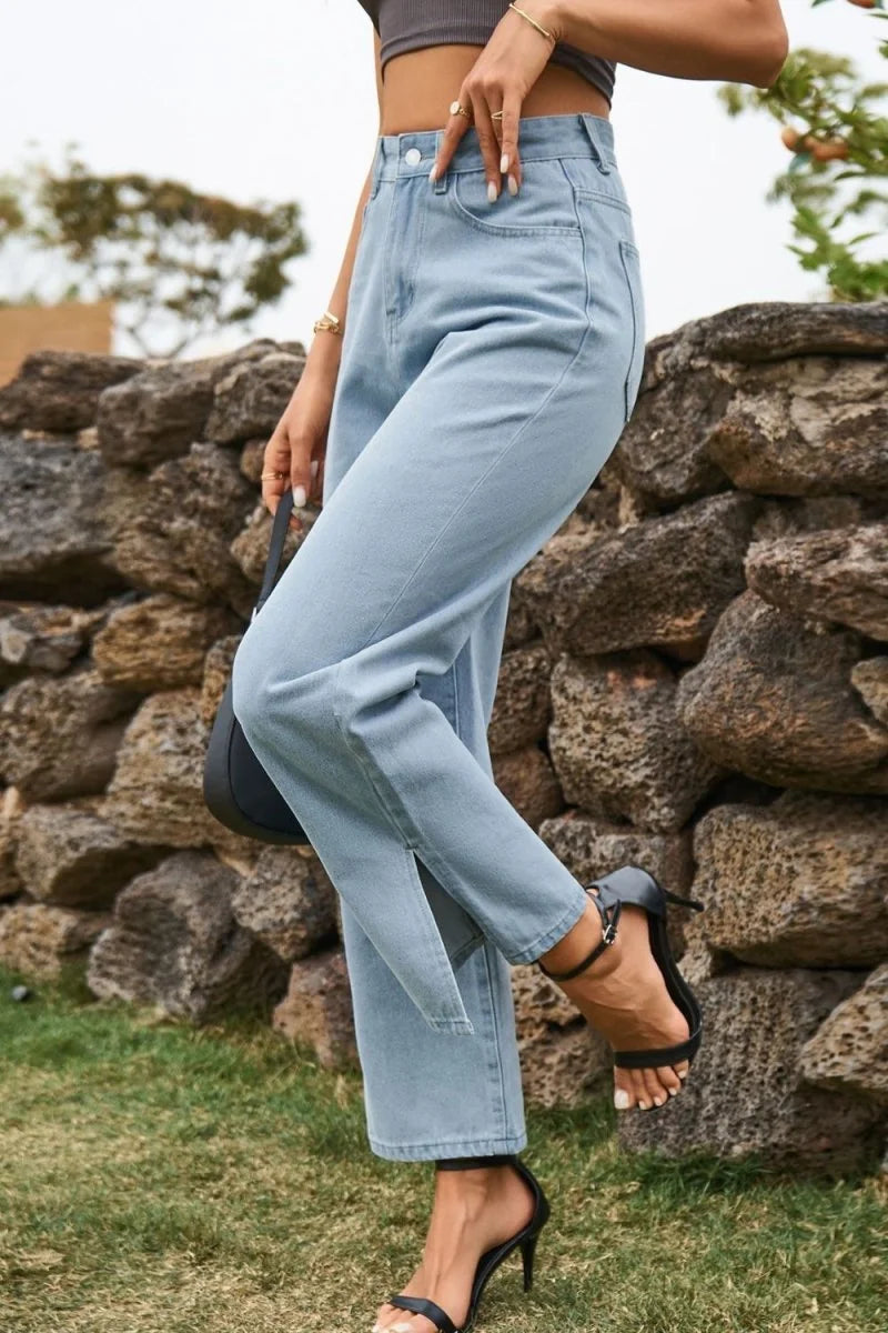 Medium wash high waist loose fit jeans with ankle slits