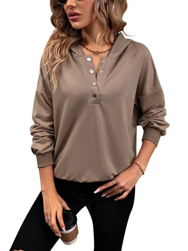 Taupe hooded sweatshirt with snap-button placket and long sleeves, worn by a model.