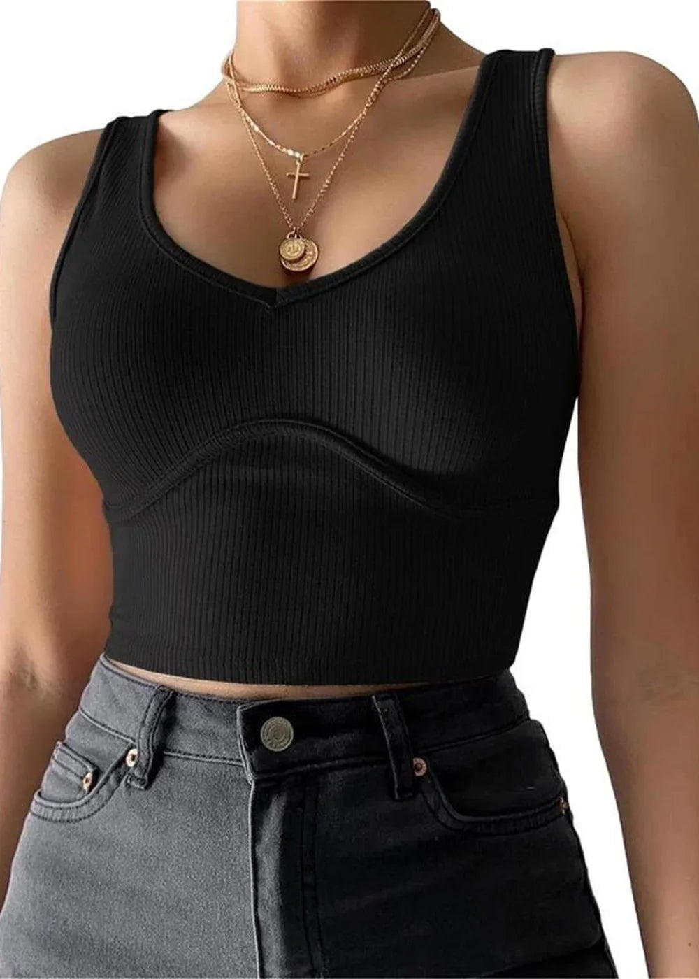 Black ribbed knit crop top with a V-neck and curved bust seam, paired with gray jeans.