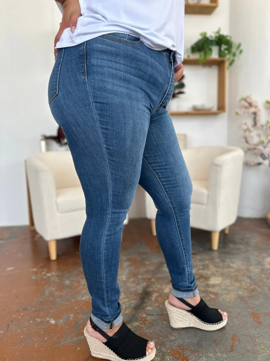Close-up of the cuffed hem on skinny jeans