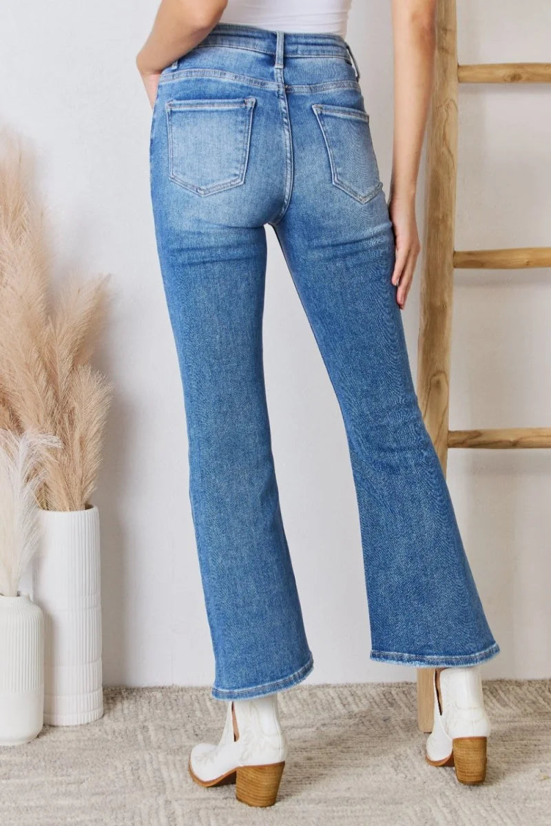 Close-up of denim fabric on high rise jeans