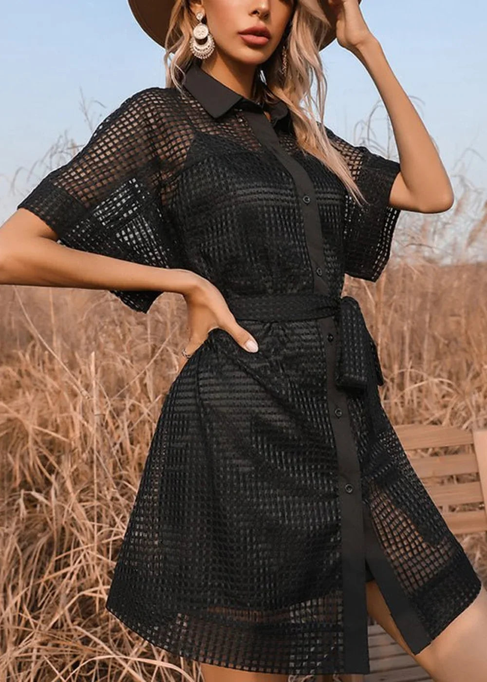 Black mesh shirt dress with short sleeves, collar, and belted waist.