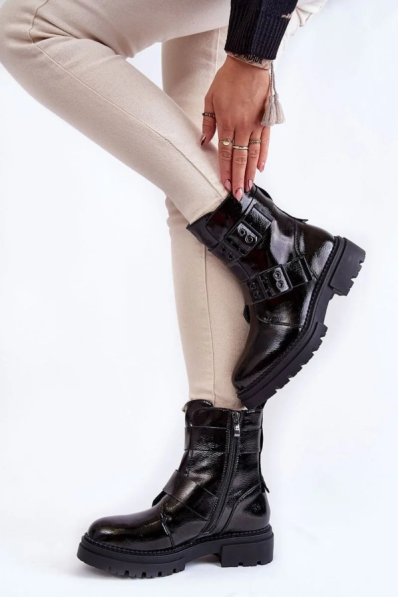 Close-up of the side zipper on black boots