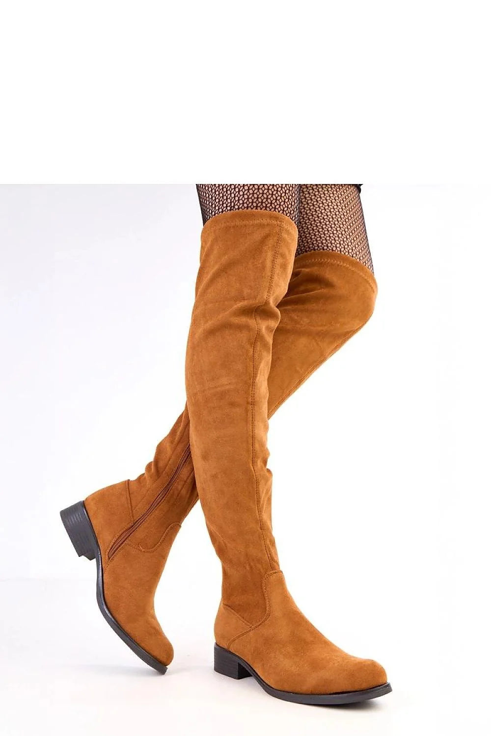 Brown suede over-the-knee boots with a side zipper and black block heel on model.