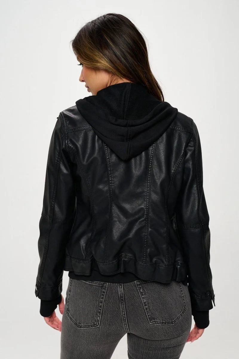 Detail of the zipper and hood on a vegan leather jacket