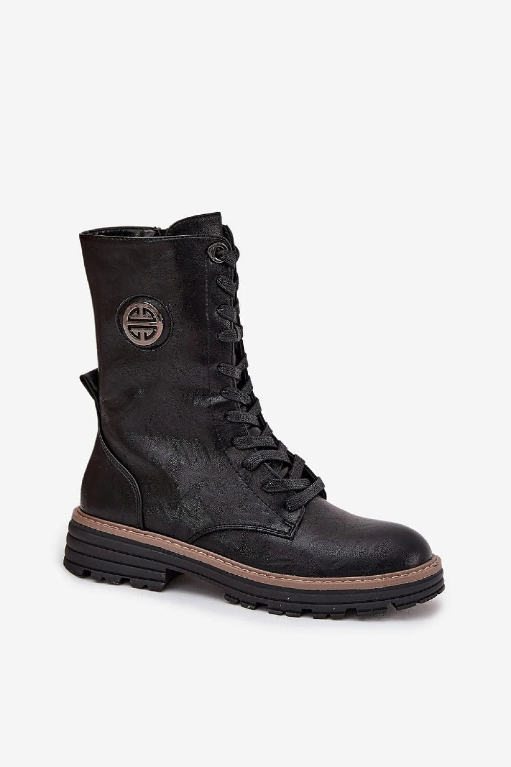 Black faux leather combat boots with a decorative circular logo, lace-up front, and thick lug sole.
