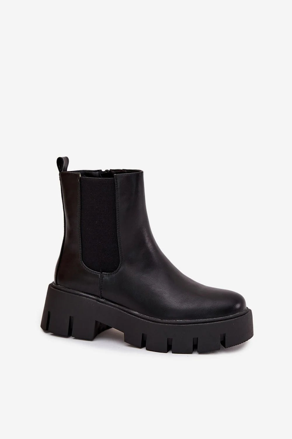 Black leather Chelsea boots with a thick lug sole and elastic side panels.