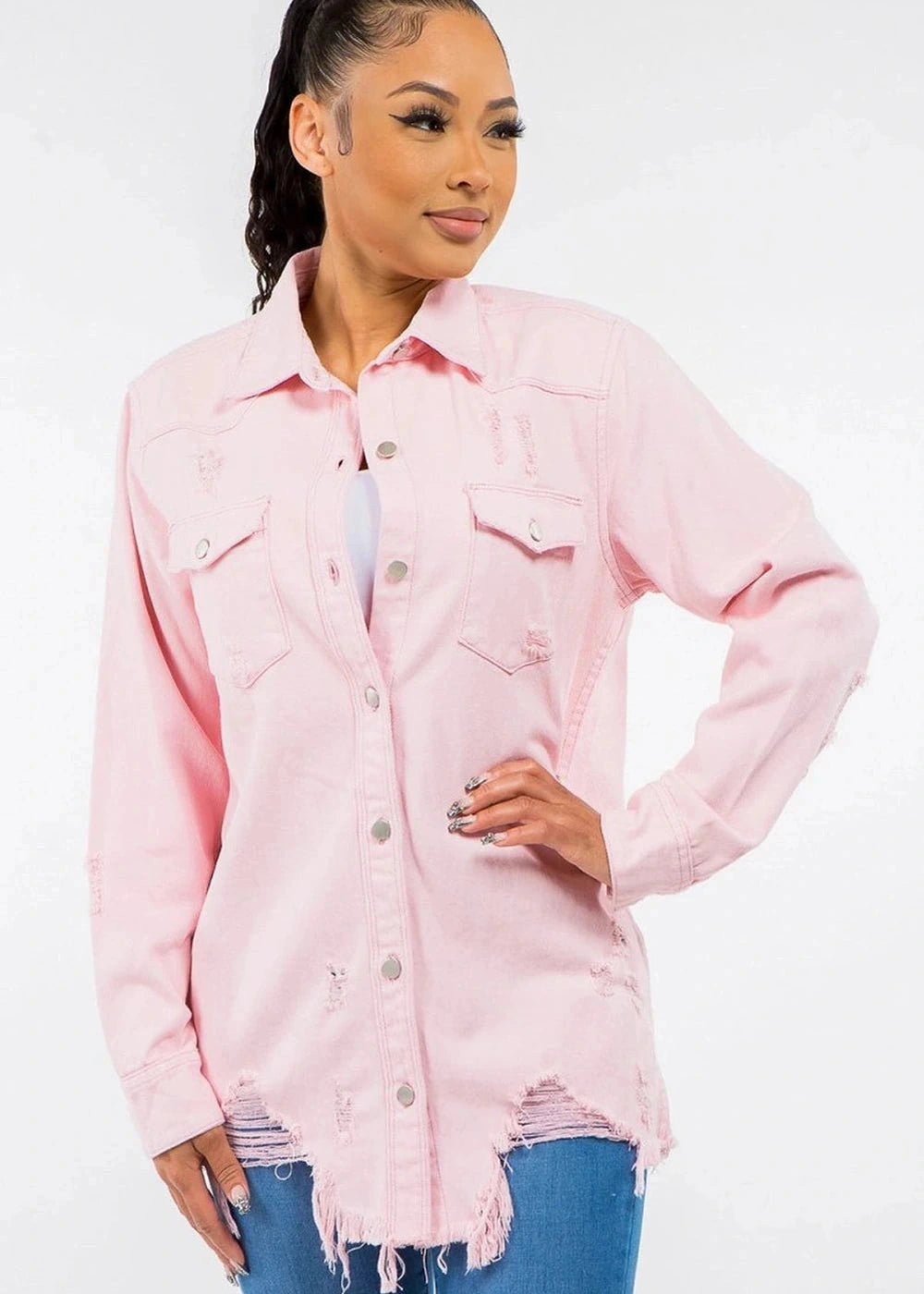 Distressed denim jacket with raw hem