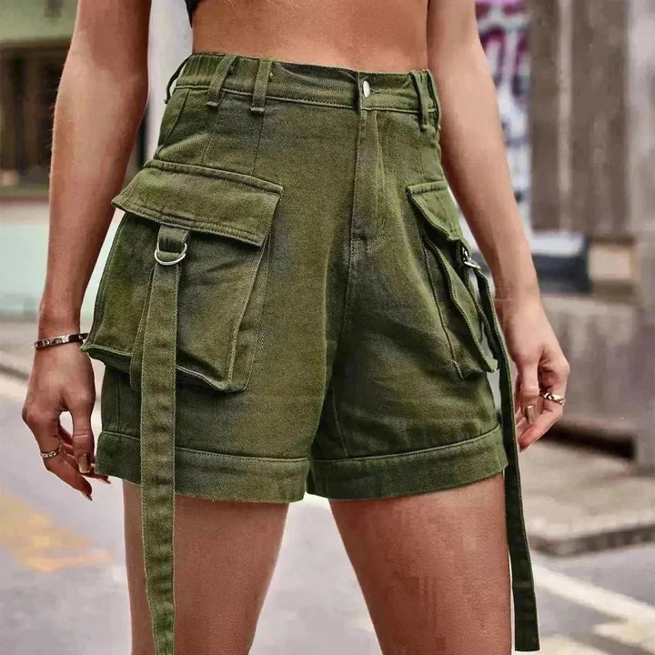 Olive green denim cargo shorts with multiple pockets and D-ring details.