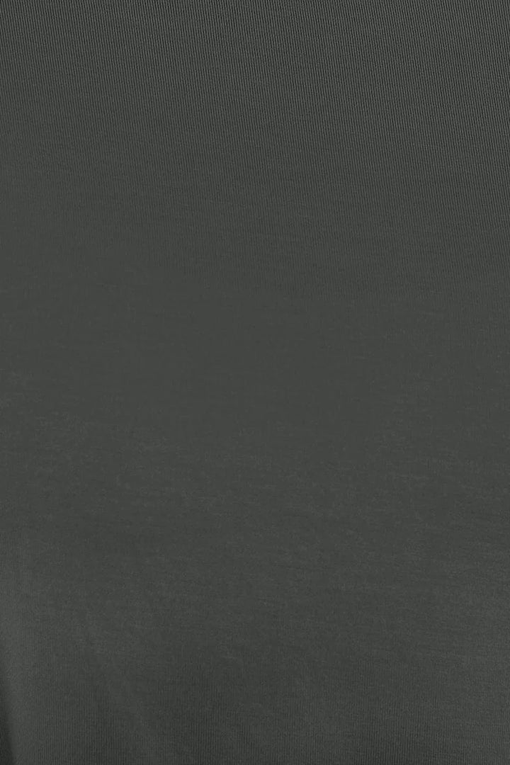 Close-up of dark gray, ribbed fabric with a soft, textured finish.