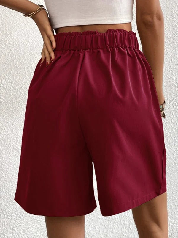Maroon paperbag waist shorts with a regular fit, made of polyester.