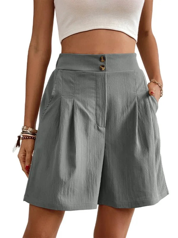 Gray textured wide-leg shorts with two front buttons and pocket details on model.