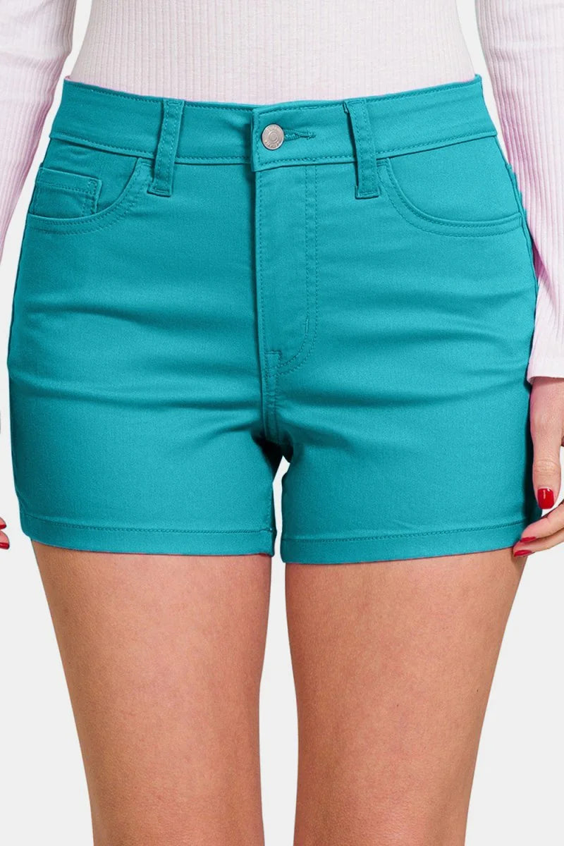 Teal cotton-blend shorts with a button and zip closure, featuring front pockets and a regular fit.