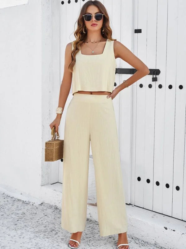 Cream linen-like wide-leg pantsuit with a square-neck crop top on a model.