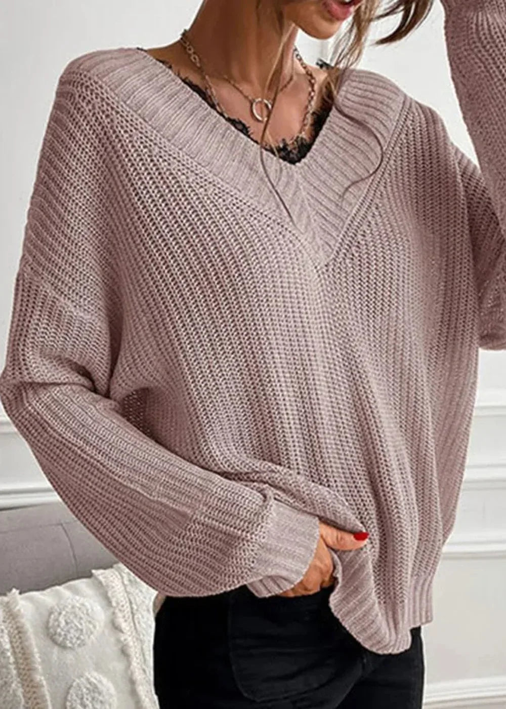 Pink women's knit sweater with lace detail