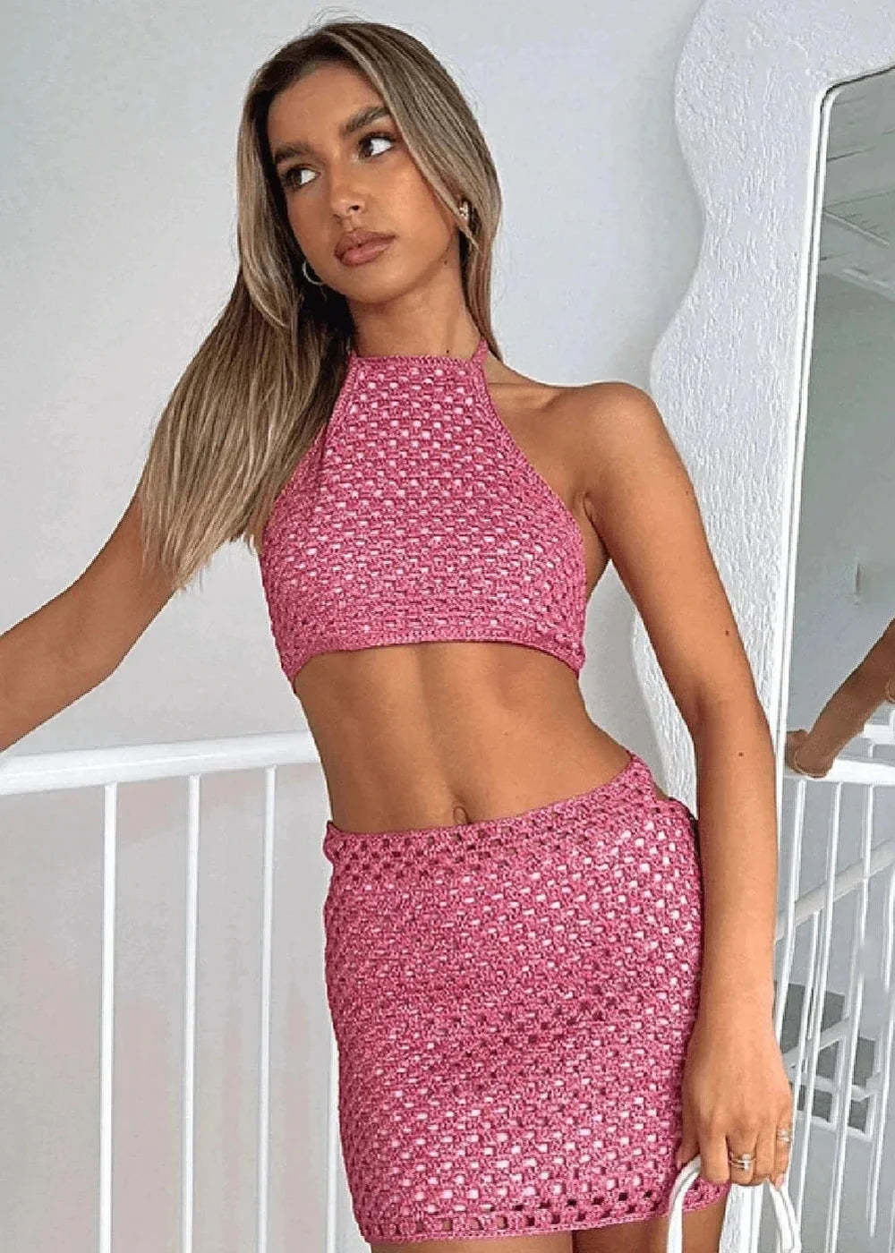 Purple knit skirt suit with halterneck top