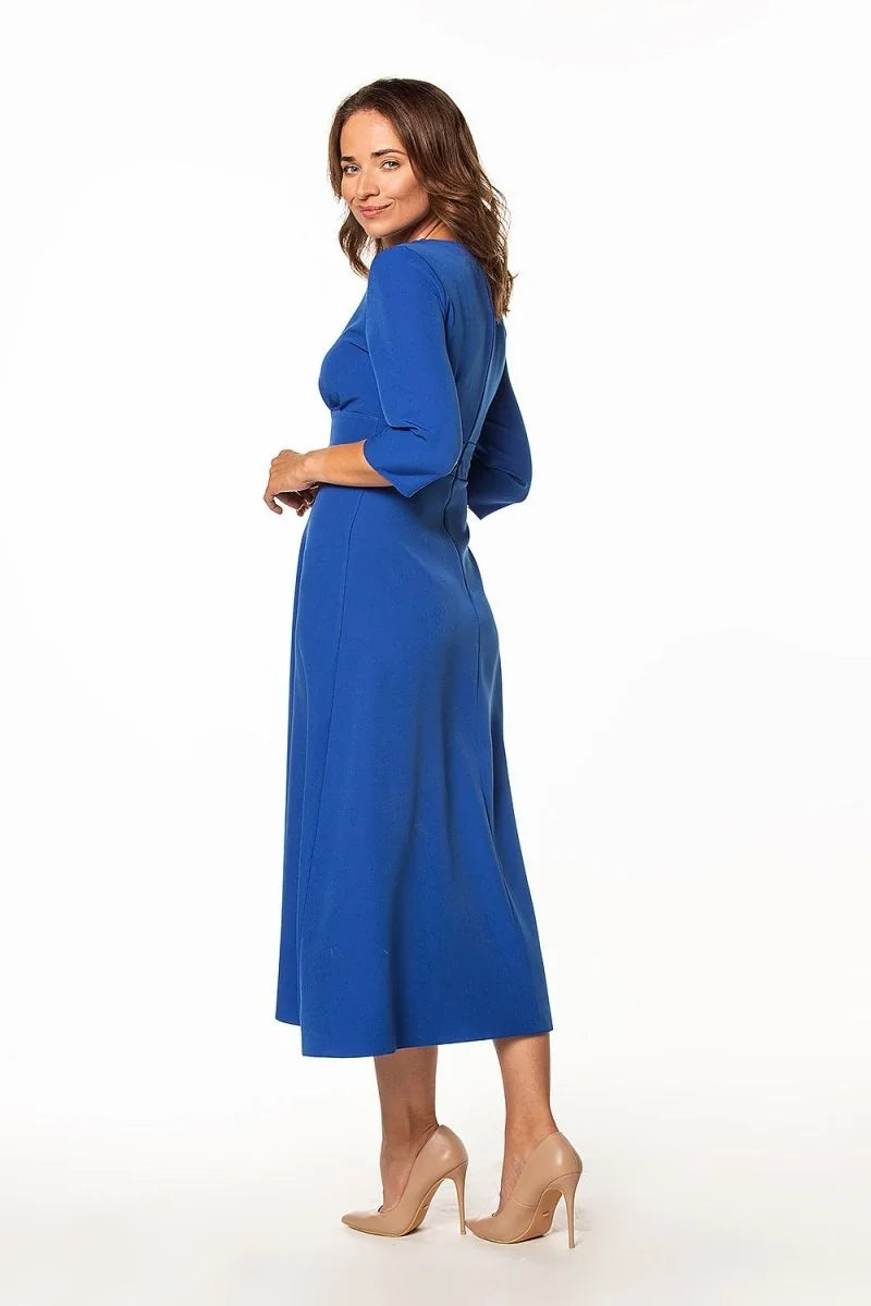 Cobalt blue midi dress with a V-neck, three-quarter sleeves, and a regular fit, shown with nude pumps.