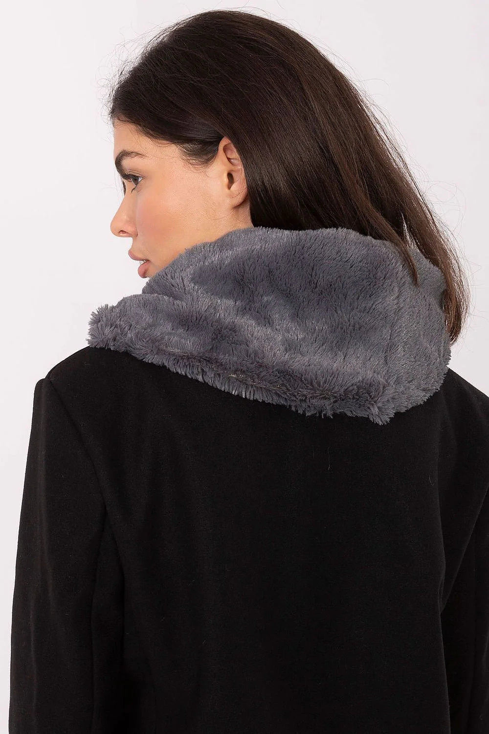 Black coat with a plush gray fur collar, shown from the back on a model.