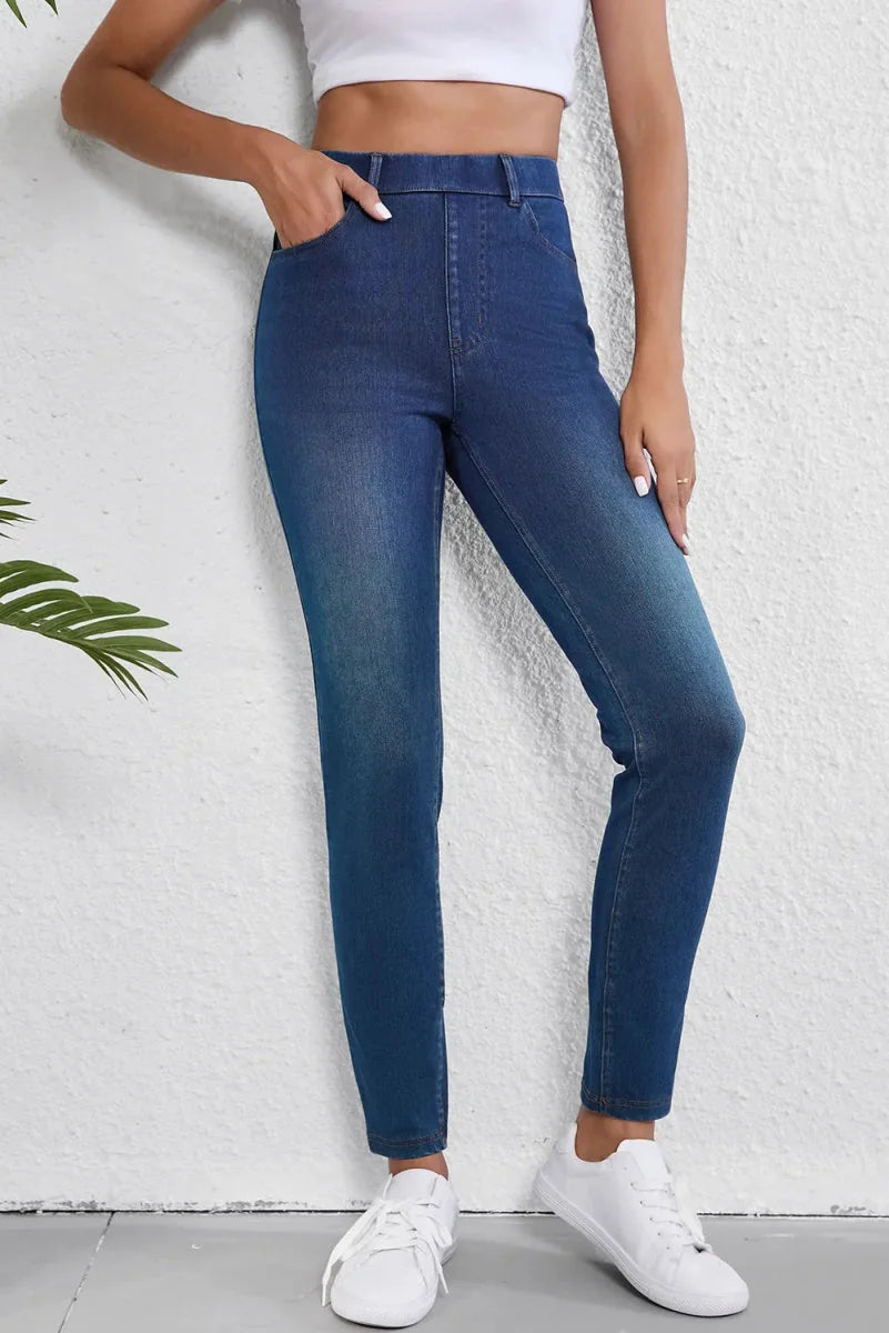 Model wearing high waist skinny jeans