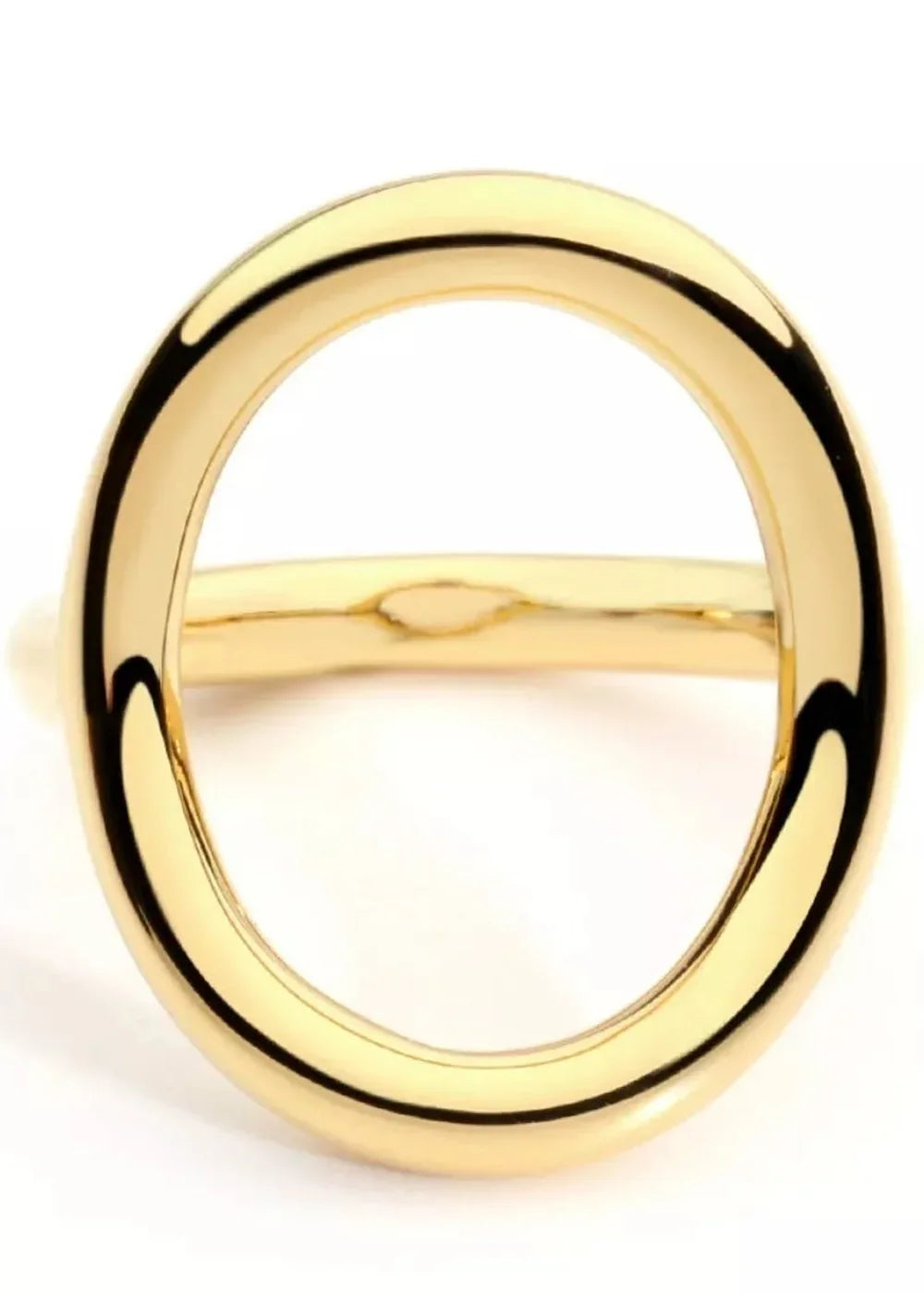 Close-up of a polished, smooth, 18K gold-plated ring with an open circle design.