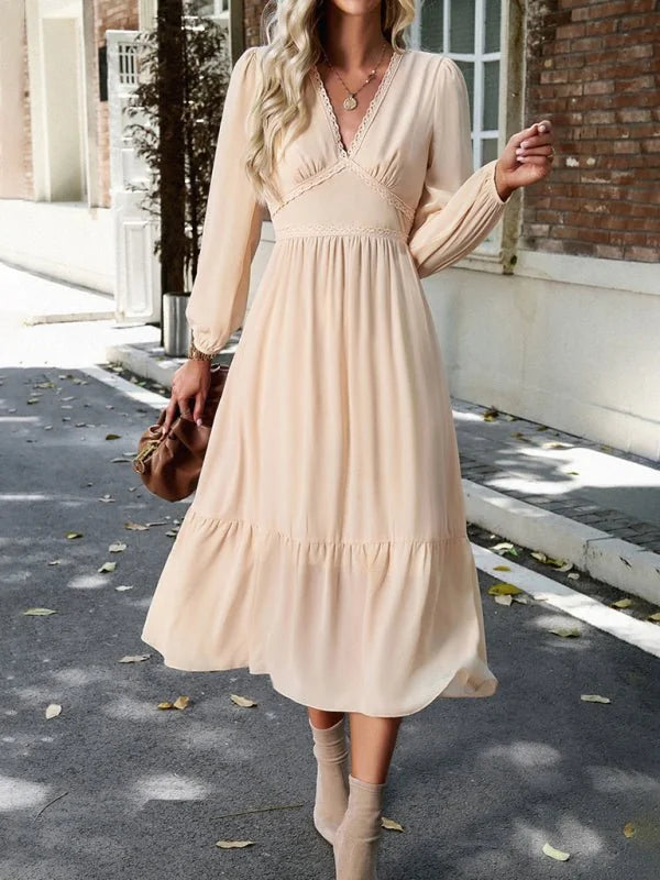 Model wearing a pink lace V-neck dress