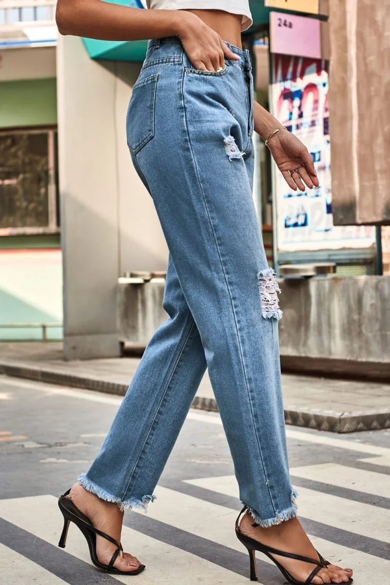 Dark wash distressed buttoned loose fit jeans