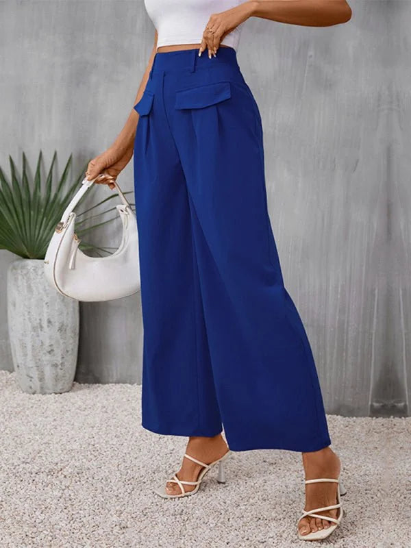 Royal blue wide-leg trousers with flap pockets and a relaxed fit.