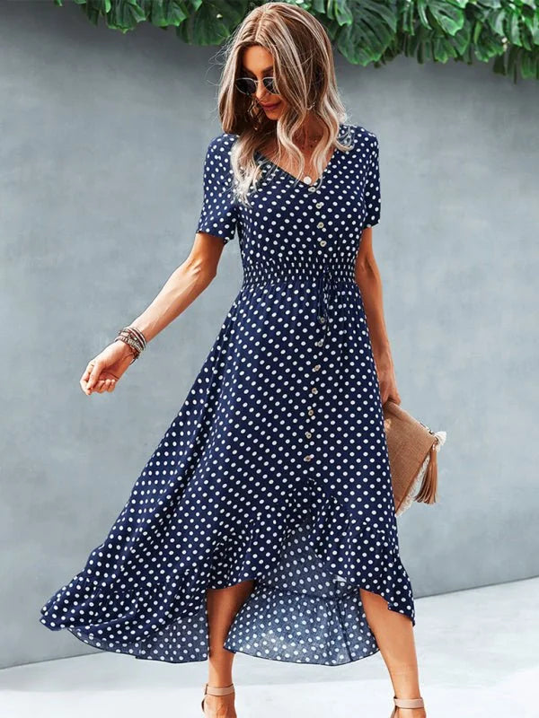 Model wearing polka dot swing dress