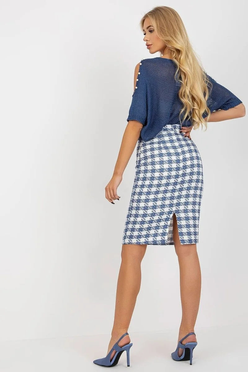 Blue and white checkered pencil skirt with a back slit and pearl-accented blue top.