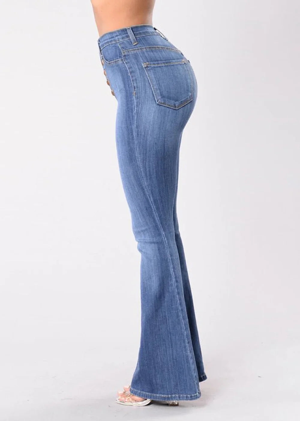 Model wearing high-waist wide-leg denim trousers