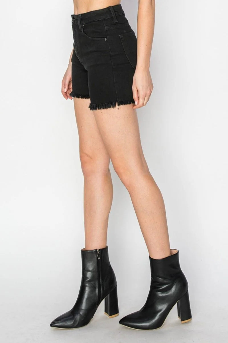 Black denim shorts with frayed hem and a regular fit, shown on a model.