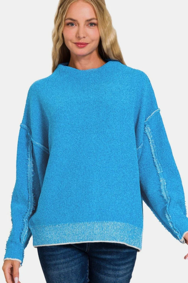 Woman wearing a mock neck sweater
