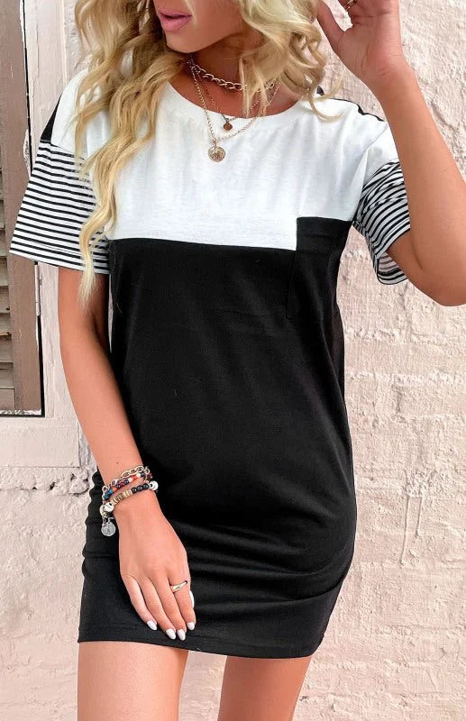 Model wearing a black and white striped t-shirt dress