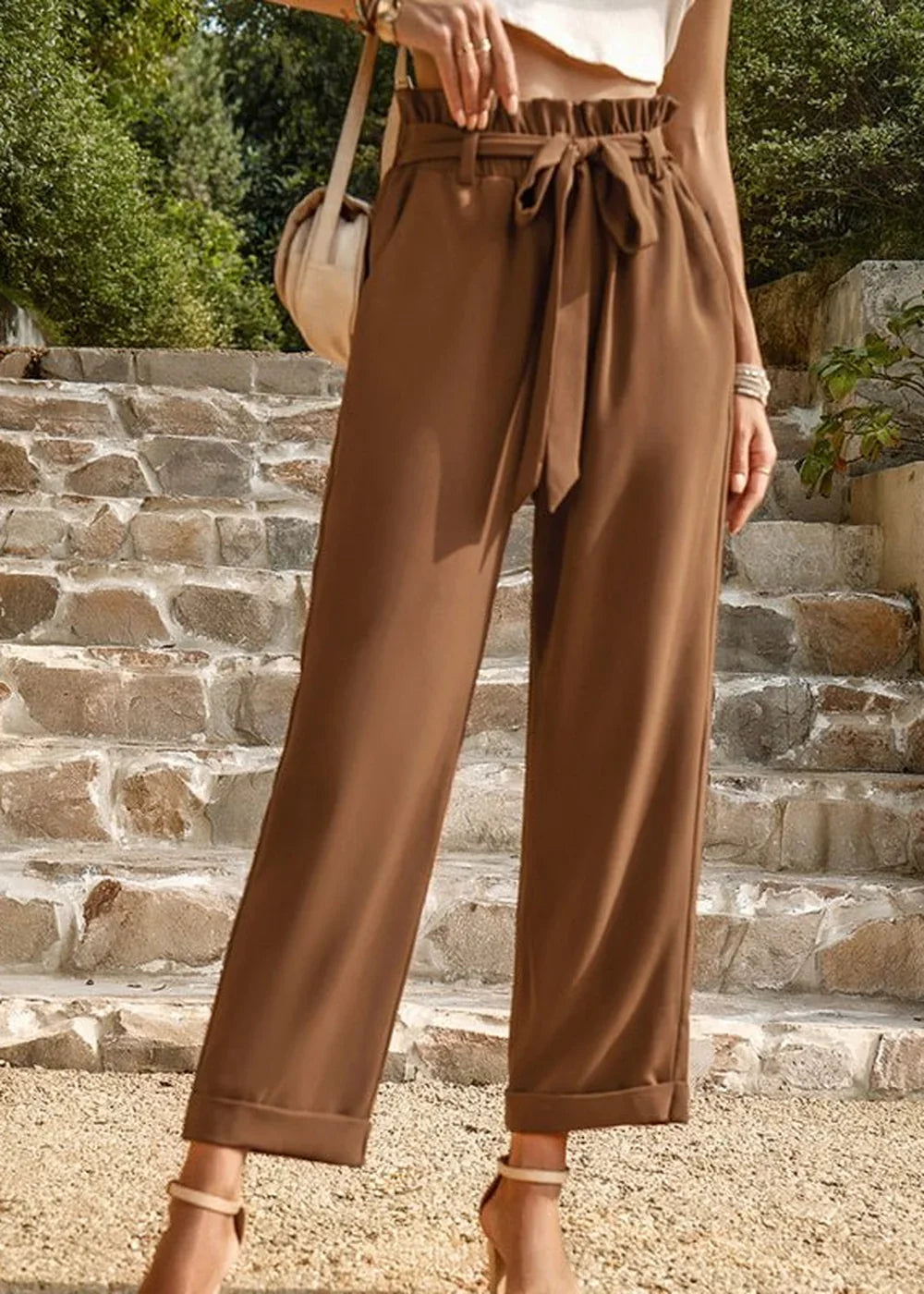 Model wearing brown commuter trousers