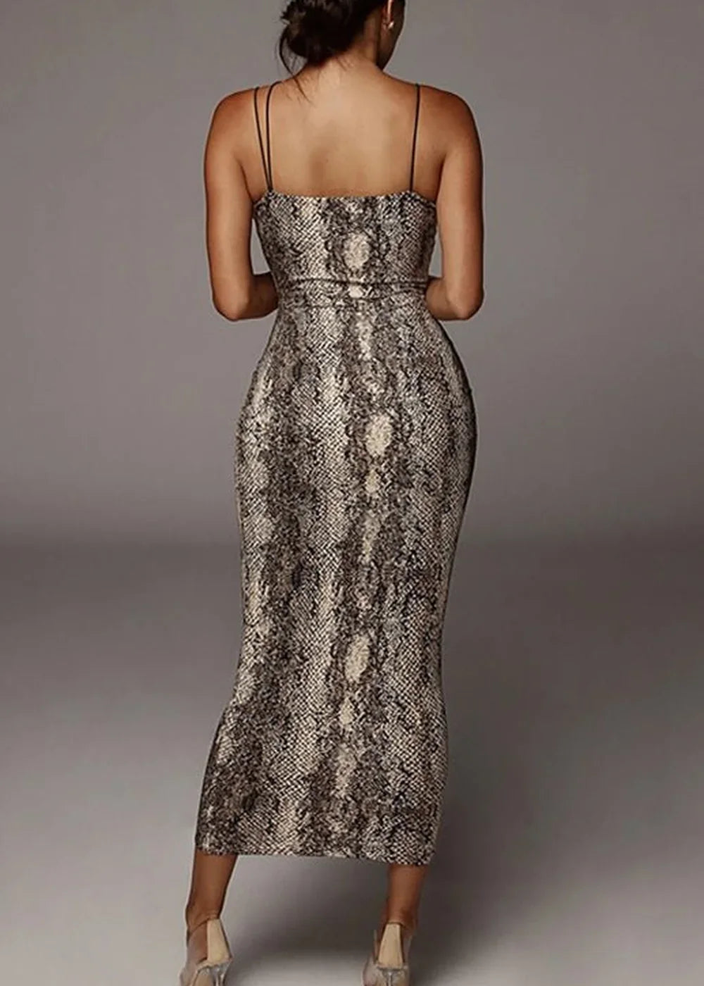 Model wearing a leopard print bodycon dress