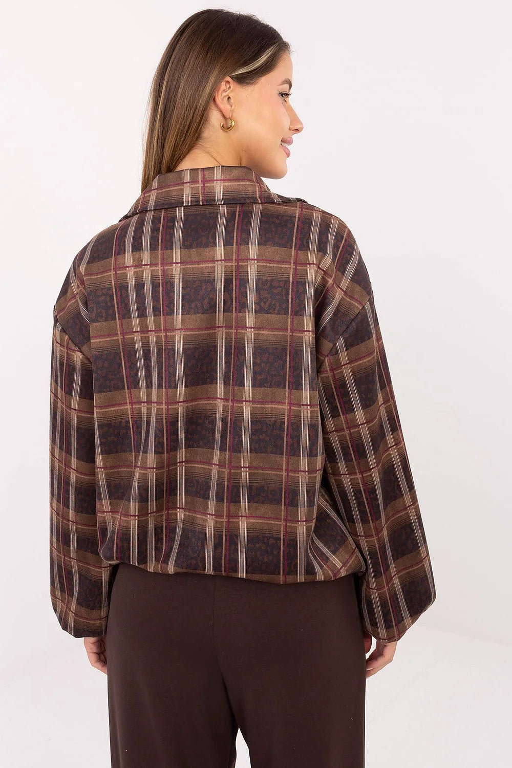 Brown and burgundy plaid print shirt with leopard accents, long sleeves, on a model.