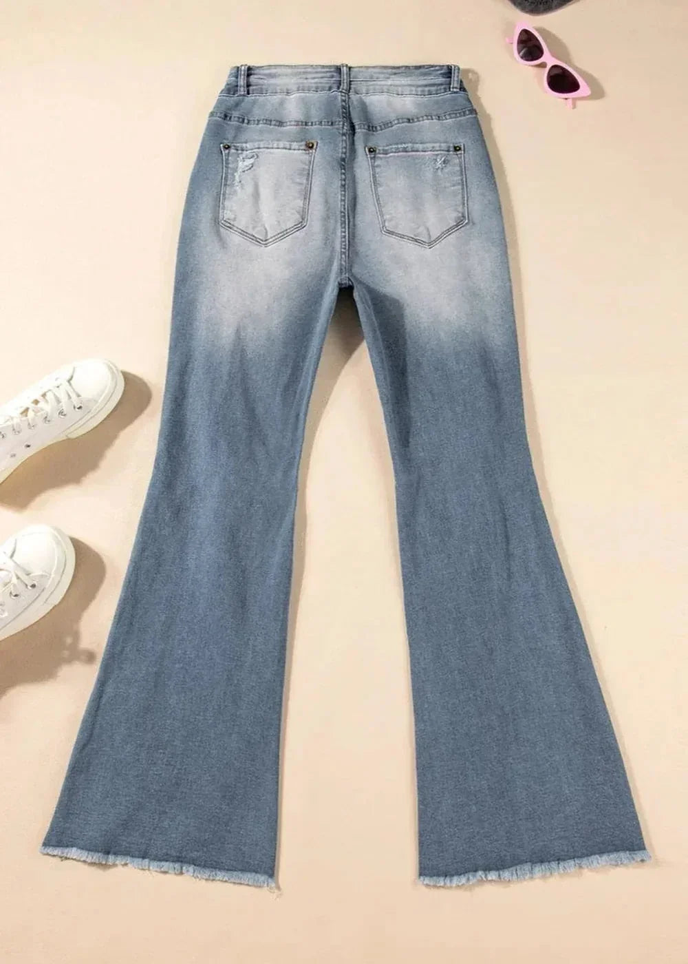 Raw hem detail on bootcut jeans