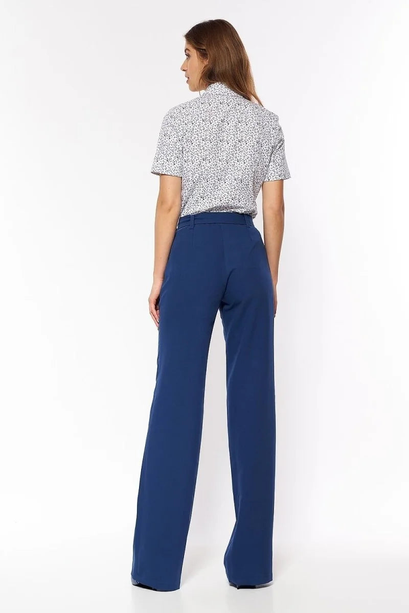Navy blue high-waisted flared pants with a subtle texture, shown from the back.