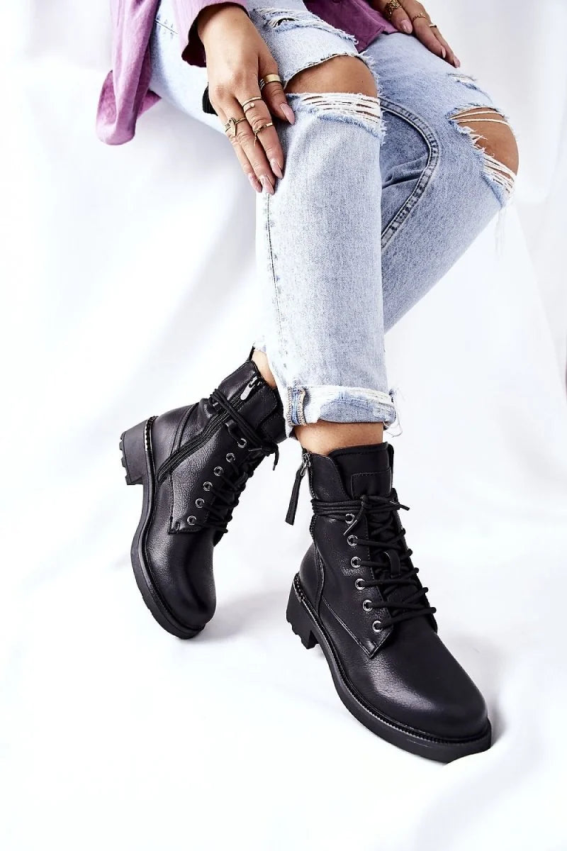 Woman wearing black suede worker boots