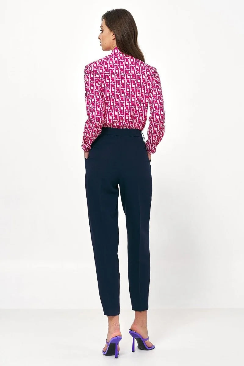 Navy blue trousers with a regular fit, shown from the back on a model.