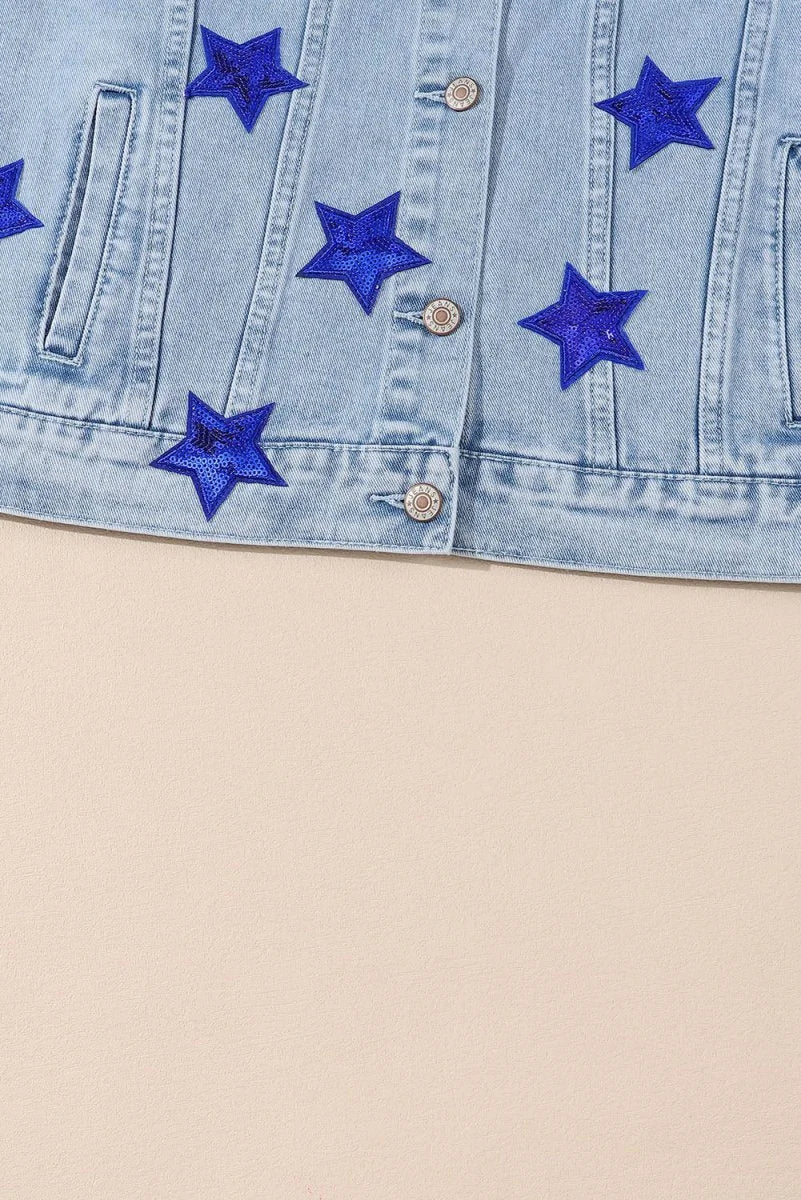 Light wash denim jacket with blue sequin stars, button front closure, and pocket details.