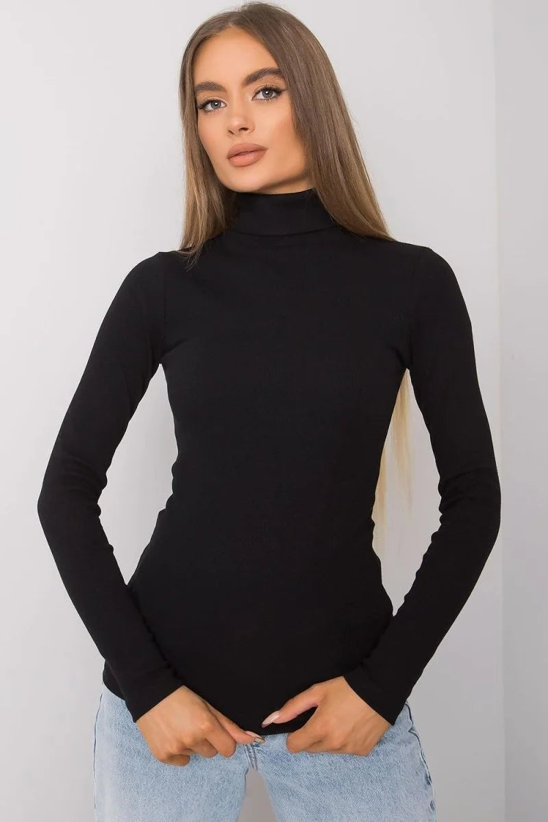 Black fitted turtleneck long-sleeve top with ribbed texture on model.