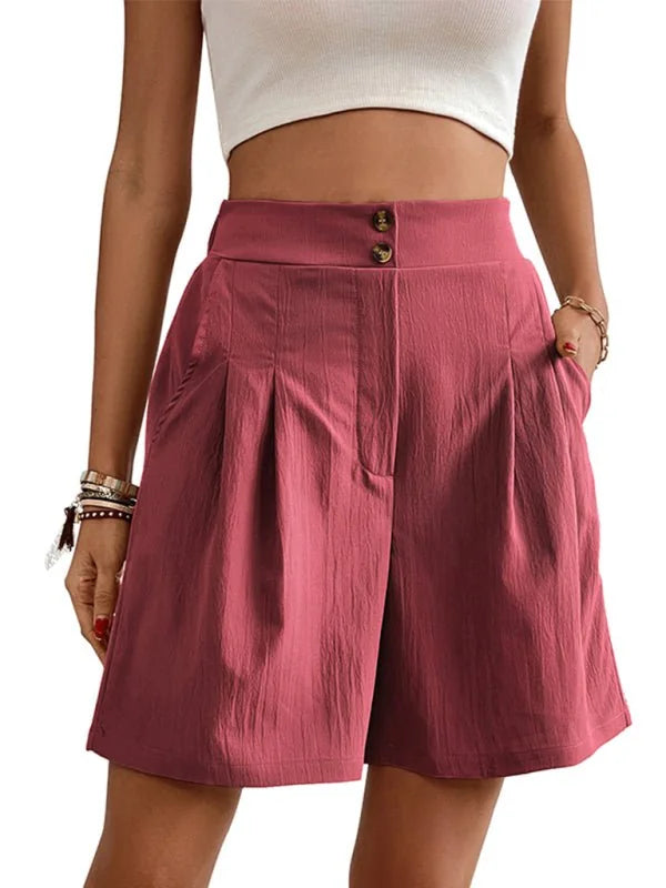 Rose pink textured shorts with a high waist and two button closure.