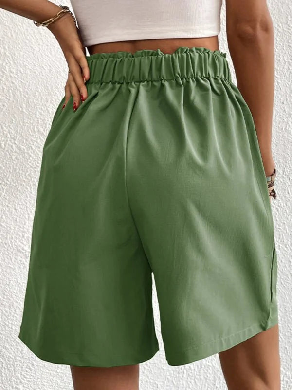 Back view of olive green casual shorts with a ruffled waistband and a relaxed fit.