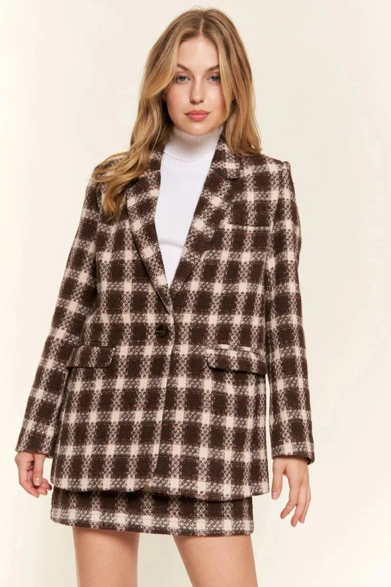 Brown and beige brushed plaid blazer with a single-button closure on model.