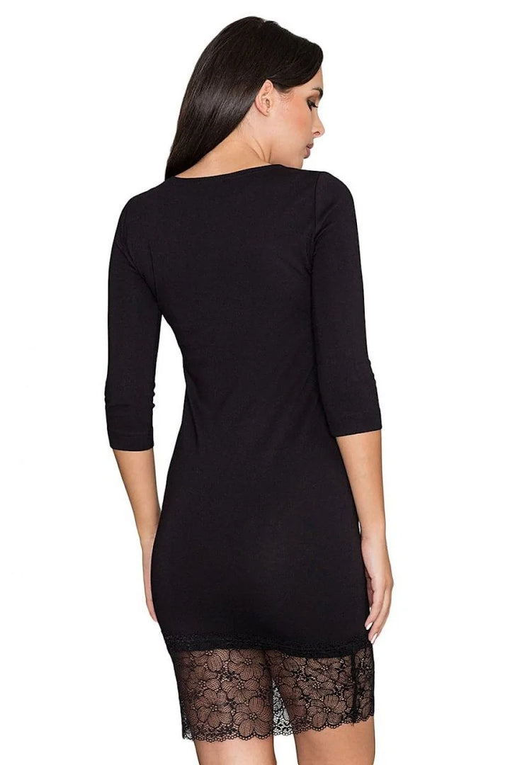 Black three-quarter sleeve dress with a lace trim hem.