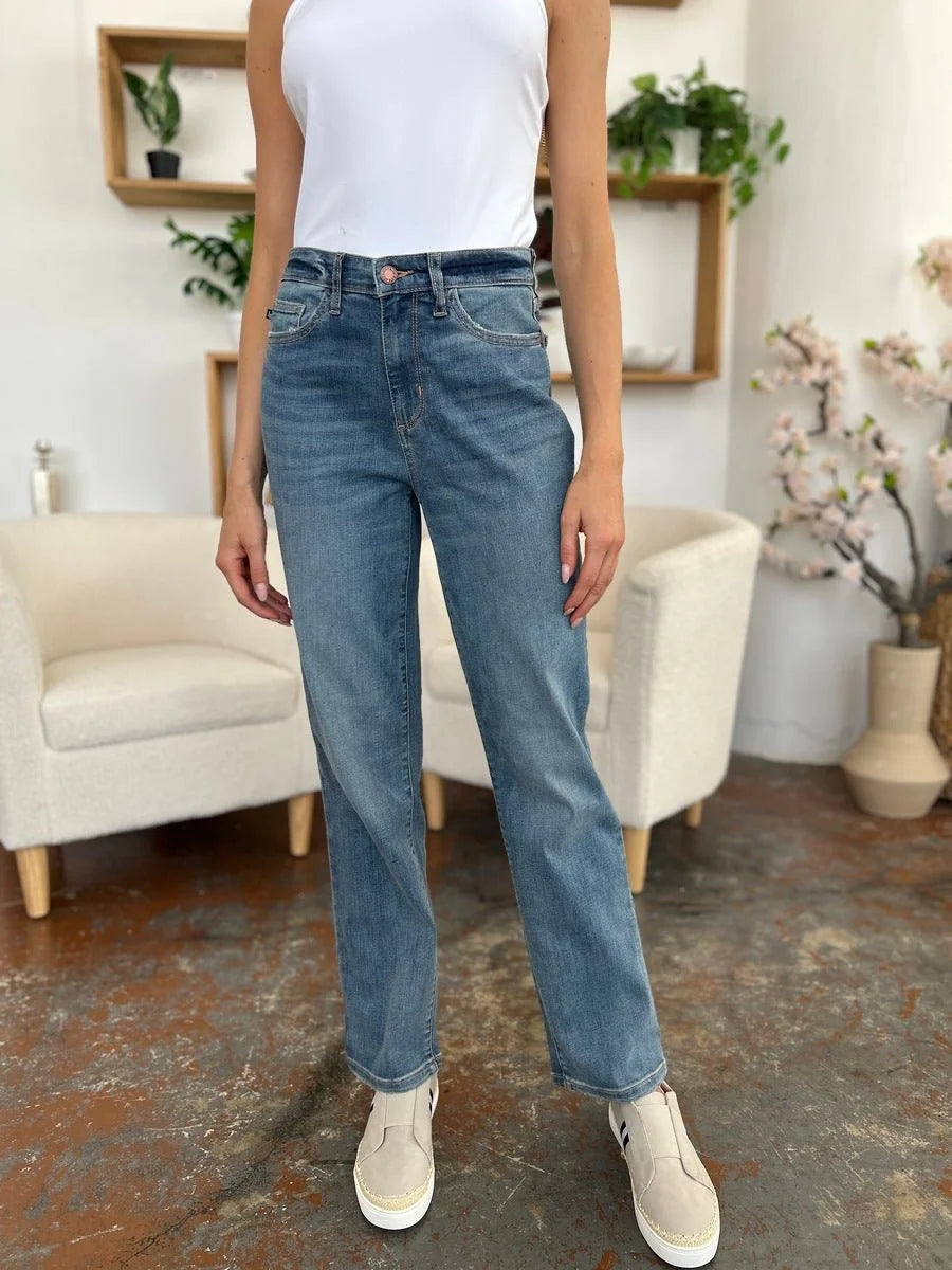 Medium wash denim jeans with a moderate stretch fit.