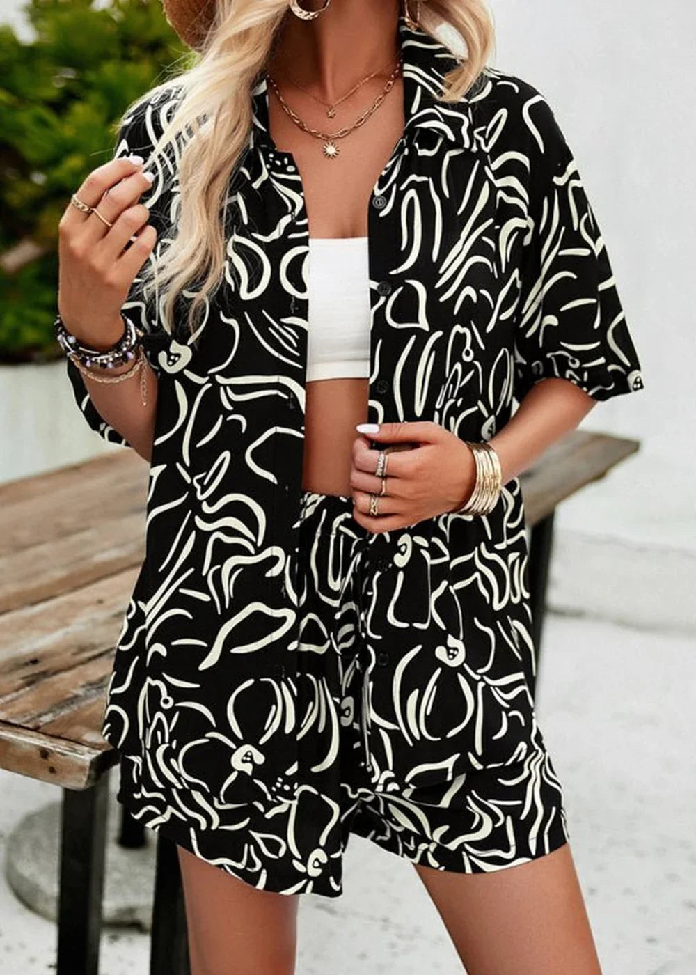 Women's black resort lapel shirt and shorts suit